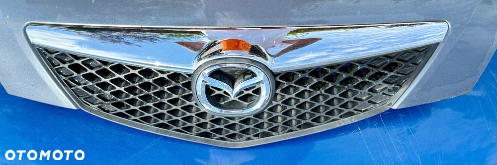Mazda 2 DY 2003/2006r maska pokrywa silnika 27K  grill wygłuszenie maski belka chlapacze lampy wzmocnienie zderzak tył blotnik kmaska pokrywa silnika drzwi lampy tył  przed lift lub polift czy sport zaslepka Moduł przetwornica Xenon starter cewka ksenon zaslepka - 3