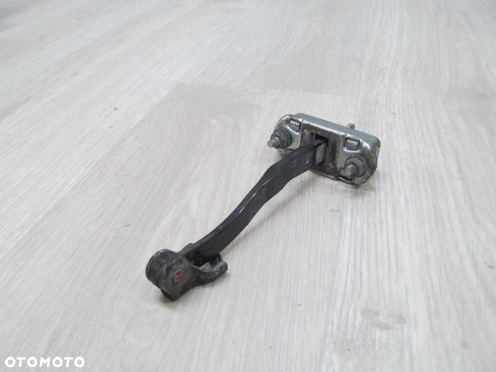 NISSAN CABSTAR MAXITY NT400 OGRANICZNIK DRZWI PRZOD 07-15 - 2