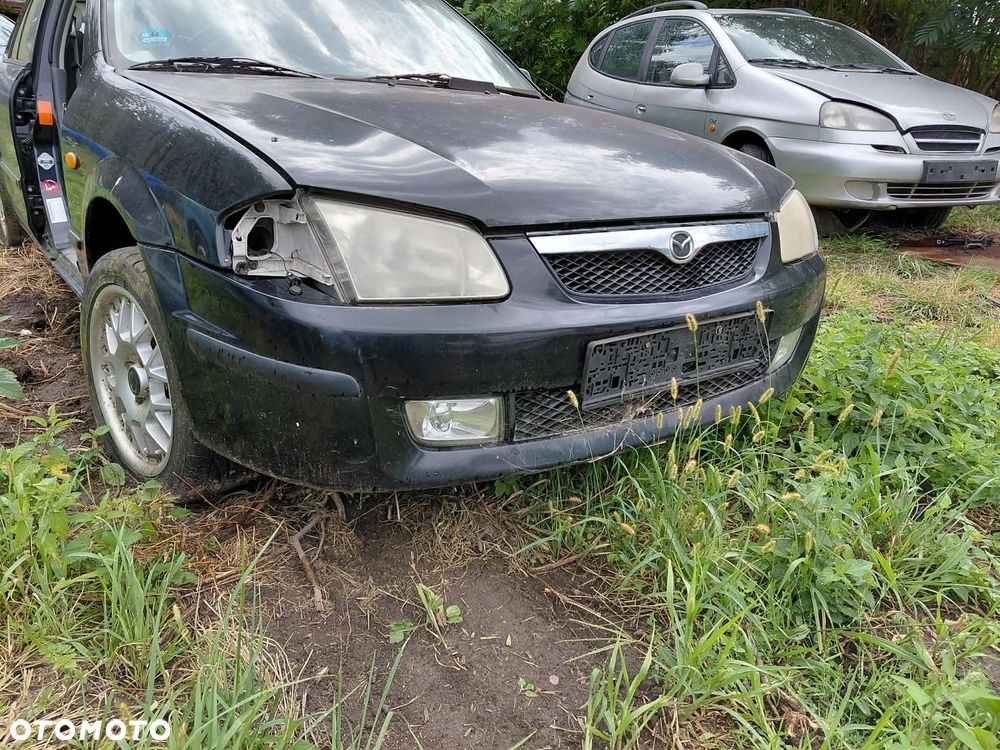 części LAMPA PRZÓD prawa lewa MAZDA 323F 2002r 1.5 benzyna hatchback - 2