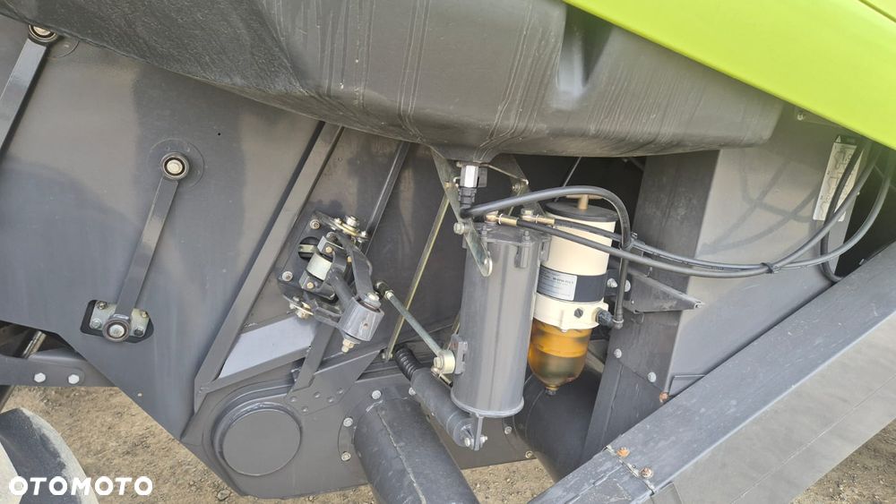 Claas Lexion 750 z hederem - 13