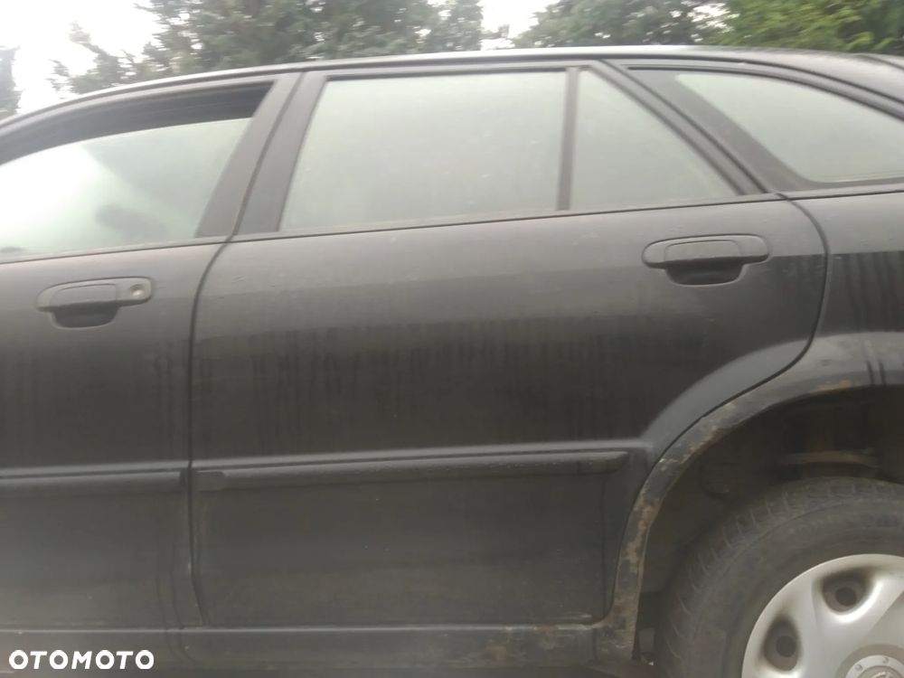 Mazda 323 F drzwi lewe tylne - 1