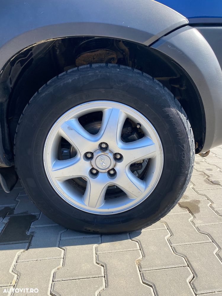 Hyundai Tucson 2.0 CRDI VGT 4WD GLS - 12