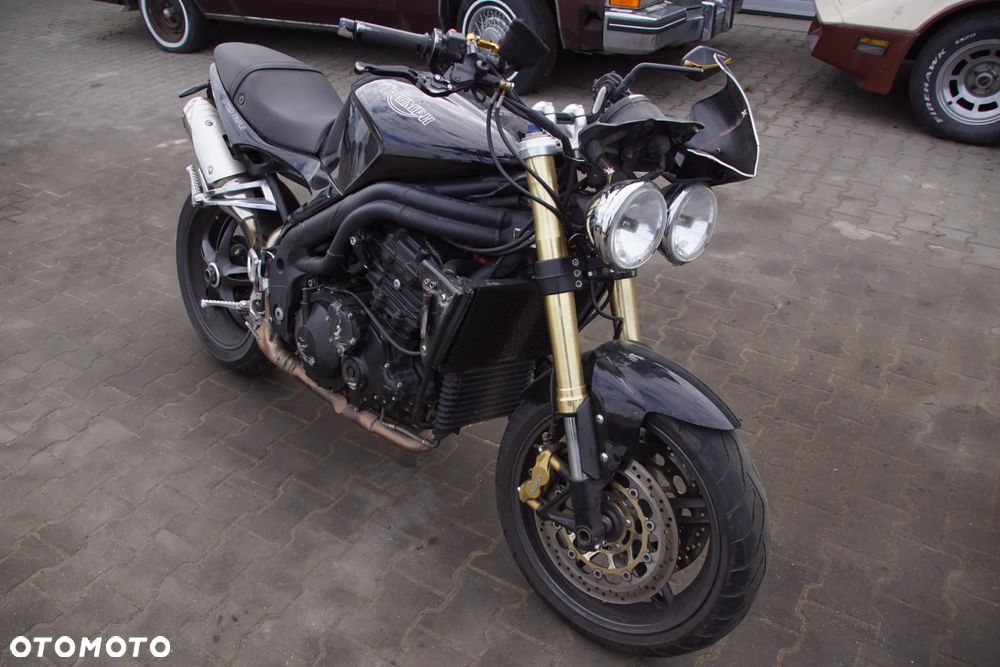 Motocykl na części - Triumph Speed Triple IV 1050 515NJ 131 KM 2005R Silnik Skrzynia Rama Lampa Siedzenie Gmol Przełącznik Manetka Laga Monowahacz Amortyzator Owiewka Osłona Sterownik Moduł Czujnik Licznik - 1