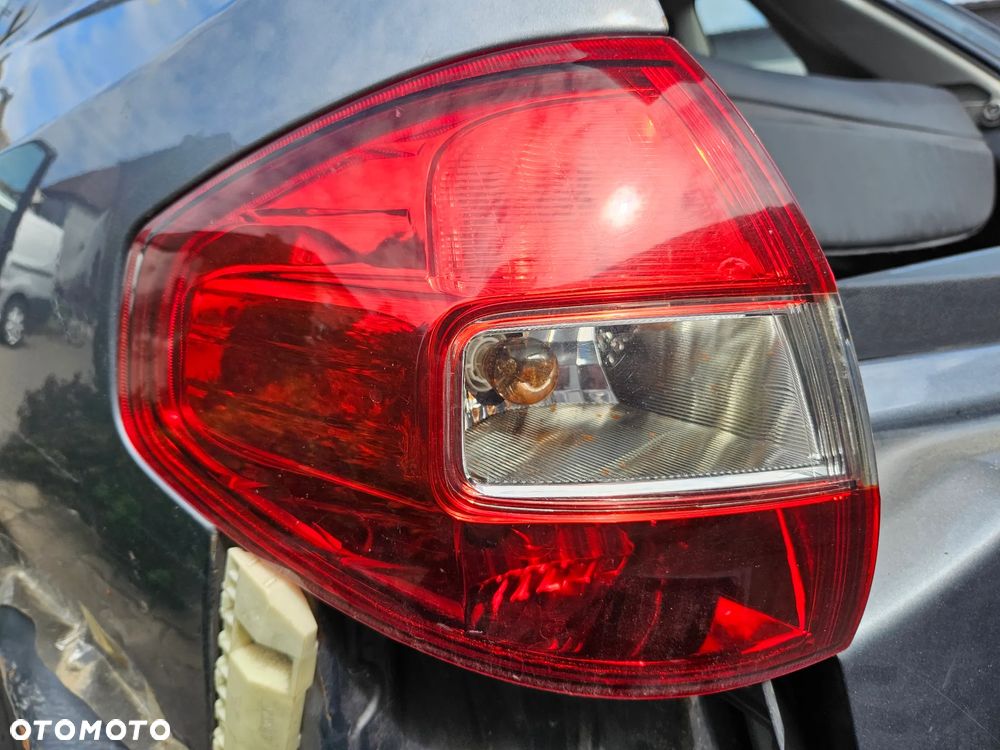 Renault Koleos I lampa tył tylna lewa w błotnik - 1