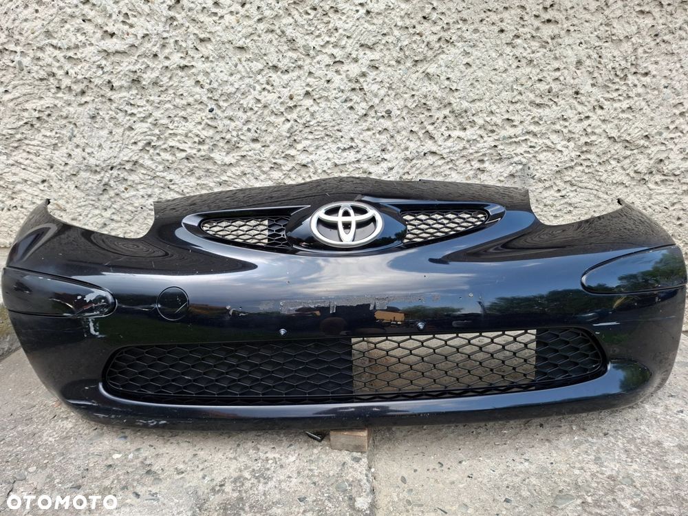 ZDERZAK PRZEDNI TOYOTA AYGO 05/09r - 2