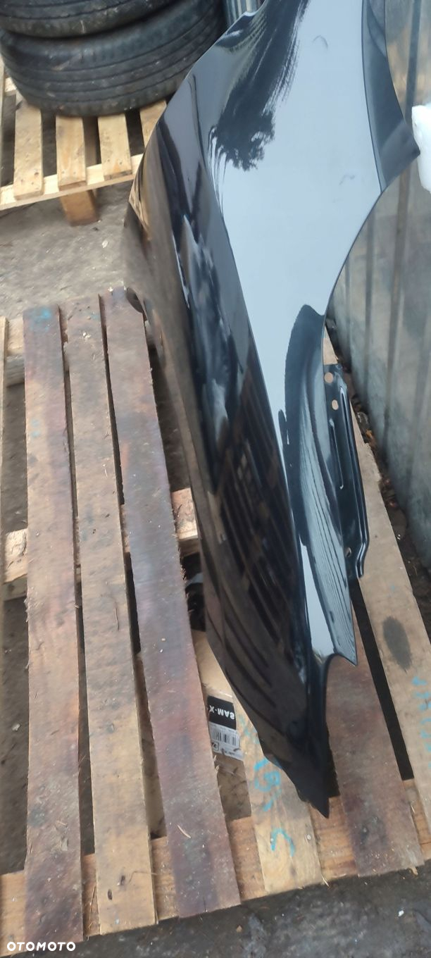 BŁOTNIK PRAWY PRZÓD MAZDA 3 BL 09 -11R BEZ OTWORU NA KIERUNKOWSKAZ KOL. 16W - 16