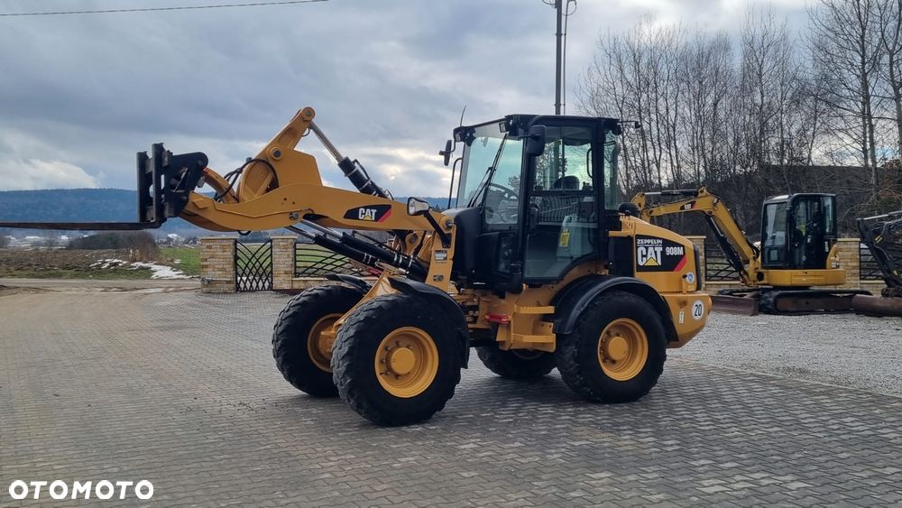 Caterpillar 908M/ Maszyna sprowadzona/ - 2