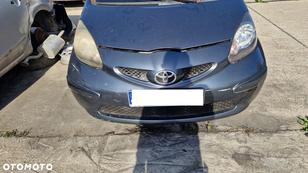 TOYOTA AYGO 05-14 ZDERZAK PRZÓD 1E0 - 1