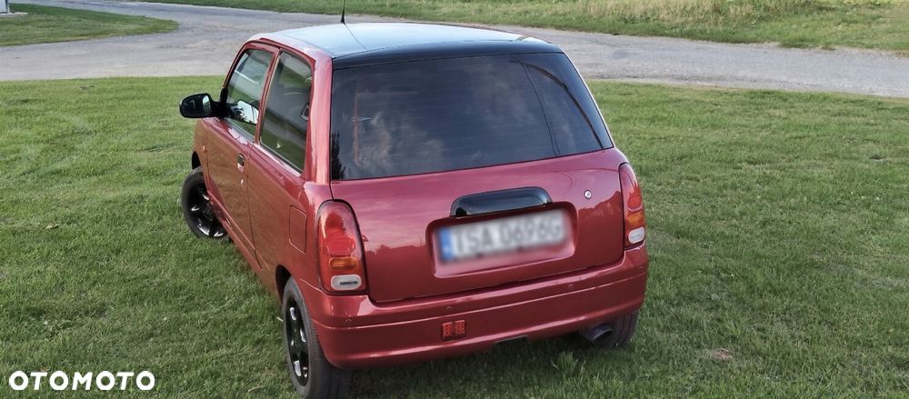 Daihatsu Cuore 1999 photo 3