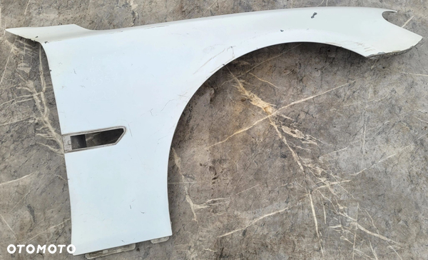 BŁOTNIK PRAWY PRZÓD PRZEDNI BMW F01 F02 F04 A96 MINERALWHITE B357