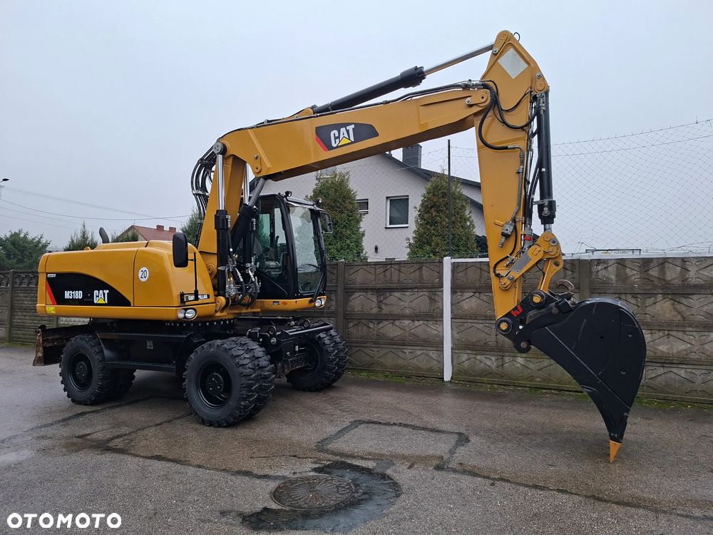 Caterpillar CAT M 318 D - 12