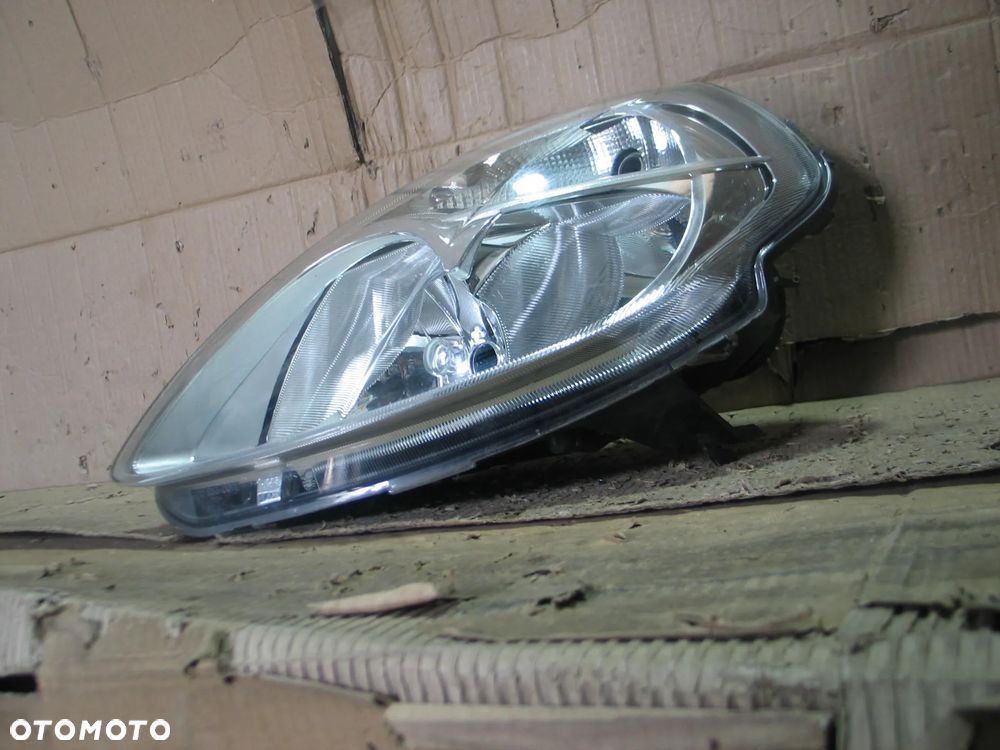 lampa przod lancia ypsilon 2 II lift 06-11r. oryginal europa - 9