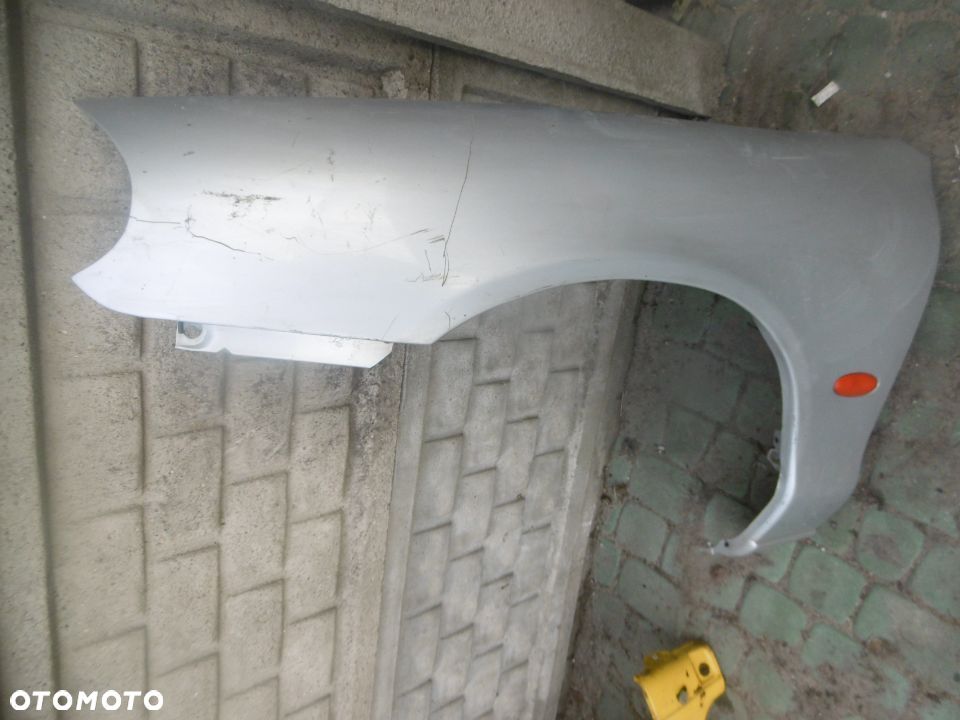 Błotnik MONDEO MK2 BEZ RDZY - 1