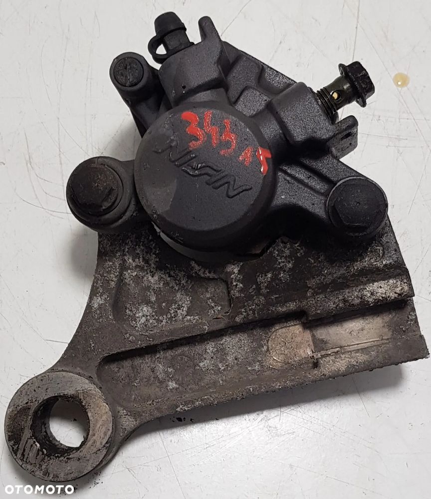 SUZUKI XF 650 Freewind Zacisk hamulcowy tył + jarzmo - 1