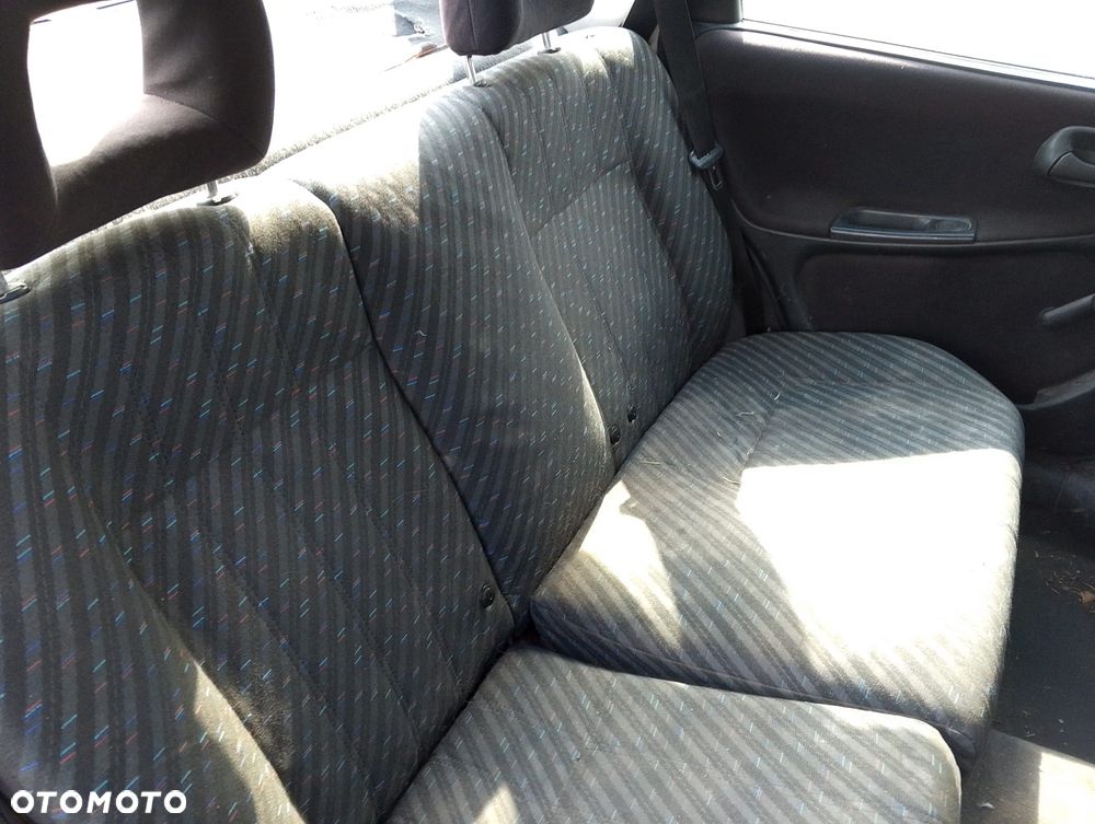 Opel Astra F (94-02r.) 1.6B 74KM. Silnik X16SZR Skrzynia F13 W374.Cały na części. GWARANCJA !!! Przód Tył Zestaw Komplet Drzwi Klapa Zderzak Błotnik Maska Grill Atrapa Szyba Pas Lampa Lusterko Boczki Fotel Kanapa Kokpit Deska Rozdzielcza Przełącznik Włącznik Sterownik Przewody Wiązka Instalacja Moduł Komputer Czujnik Listwa Pompa Alternator Wtryski Głowica Rozrusznik Kompresor Sprzęgło Dwumas Silnik Skrzynia ABS Klimatyzacji Paliwa Wspomagania Kolektor Turbina Przepustnica Zawór Chłodnica Koło Hak Belka Sanki Zawieszenie Mcpherson Półoś Amortyzator Wydech Tłumik Zacisk Most - 8