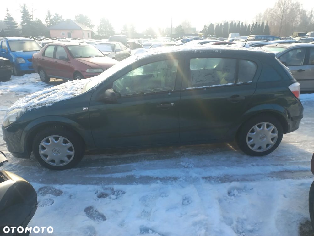 Opel Astra H lll 1.4 16v 04r Z398 drzwi lewe przednie kompletne