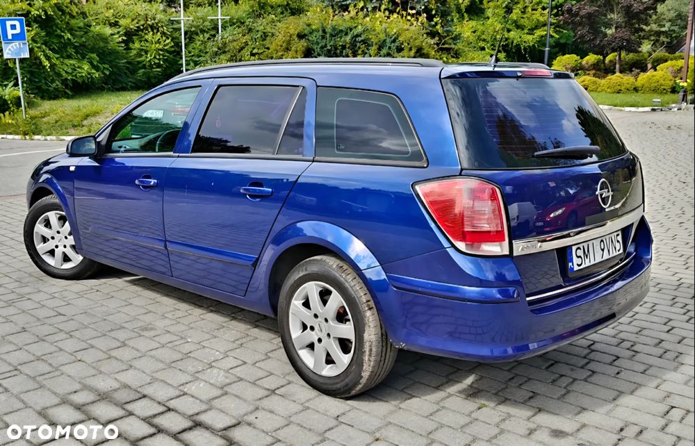 Opel Astra 1.4 Caravan Cosmo - 32