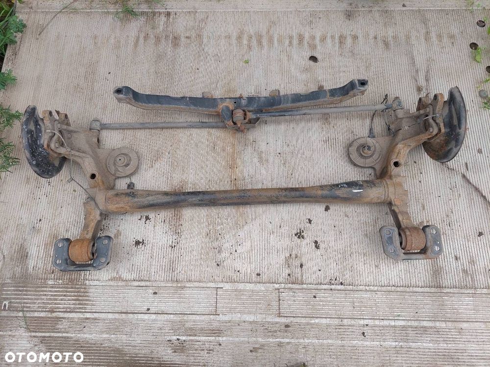 BELKA OŚ ZAWIESZENIA TYŁ OPEL ASTRA J KOMBI - 1