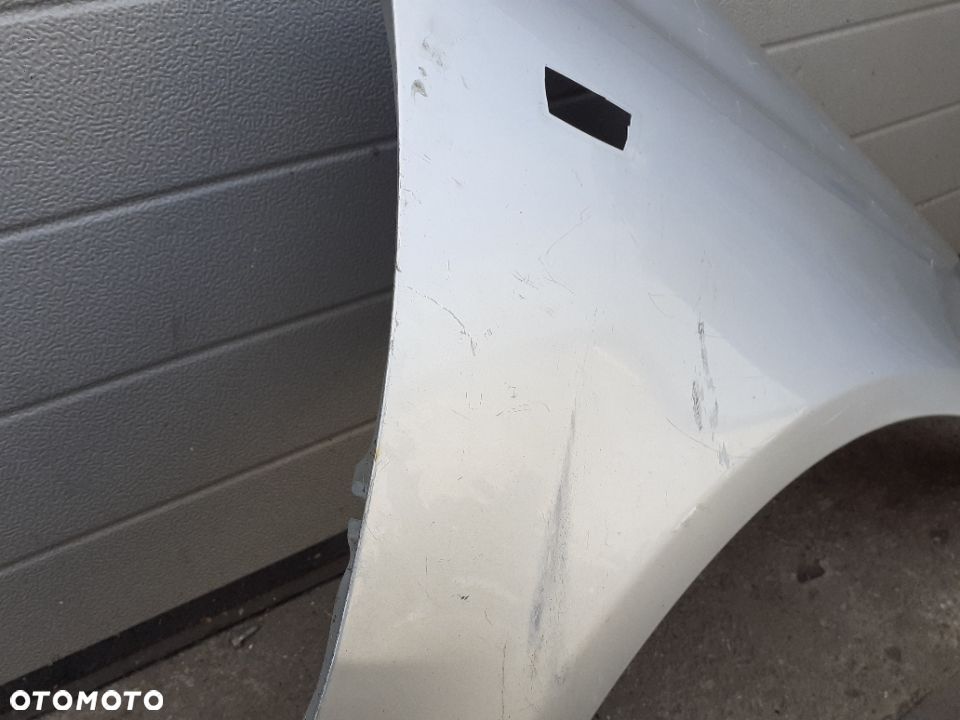 BŁOTNIK PRAWY PRZÓD OPEL CORSA D - 2