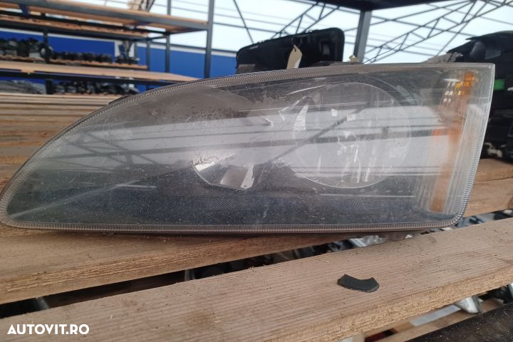 Far stanga Ford Focus 2  [din 2004 pana  2008] seria wagon 5-usi 1.6 TDCi MT (109 hp) - 2