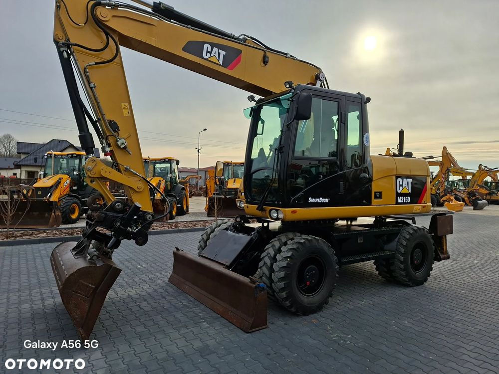 Caterpillar CAT M315D rok 2012 - 11