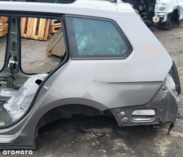 VW GOLF KOMBI VII 16r BŁOTNIK LEWY TYLNY TYŁ