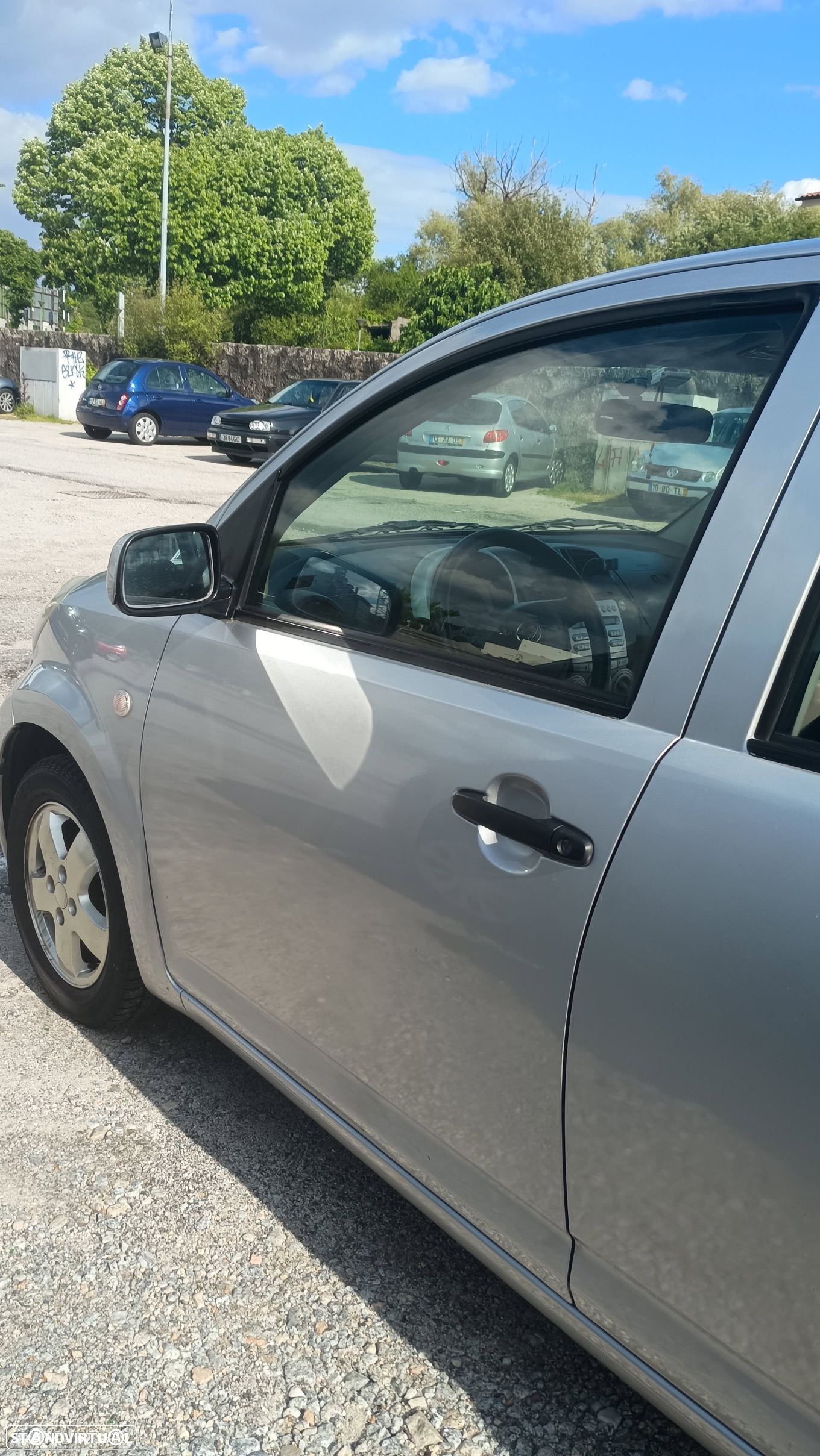 Daihatsu Sirion 1.0 - 8
