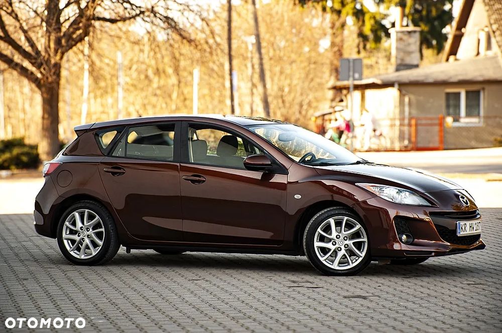 Mazda 3 1.6 MZR Active Plus - 16