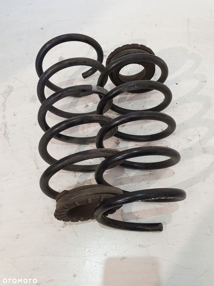 sprężyny zawieszenia tył opel corsa e 18r 1.2b kpl - 1