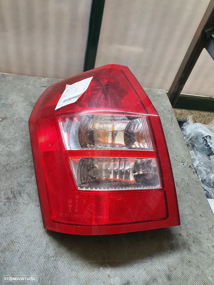 FAROLIM ESQUERDO DODGE CALIBER 06- / 04805967 - 1