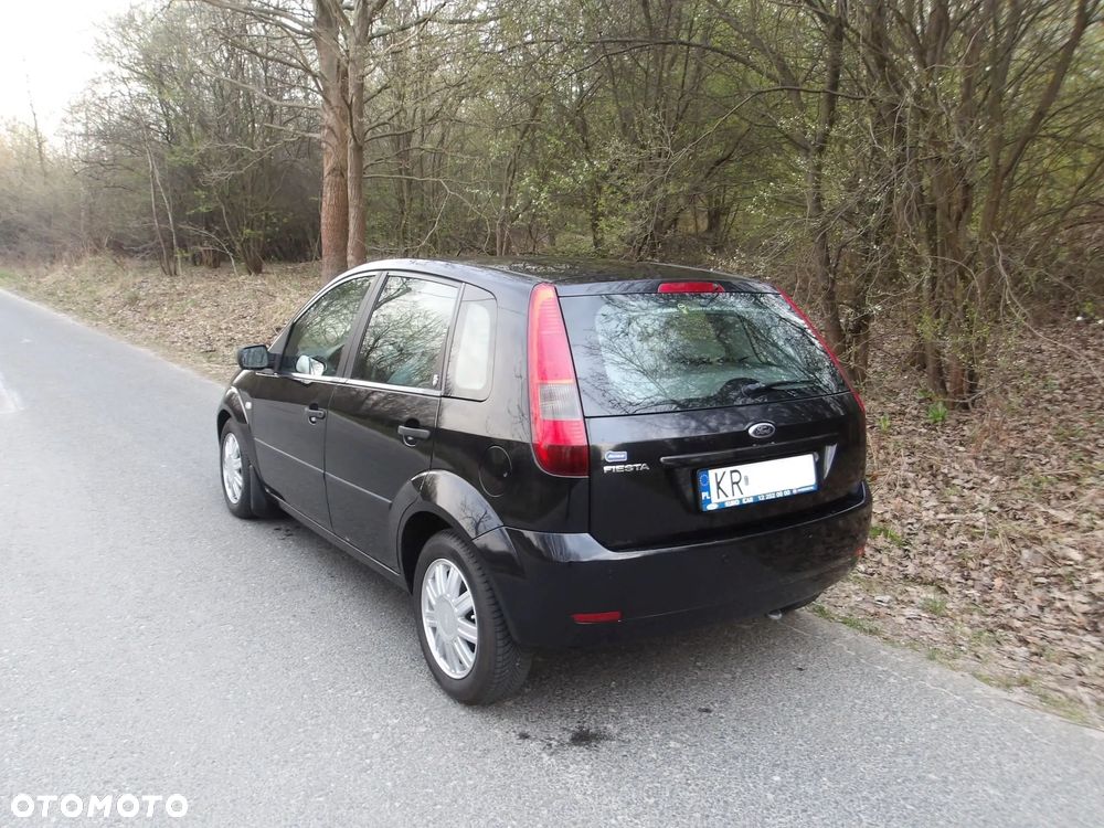 Ford Fiesta 1.4 Ghia - 7