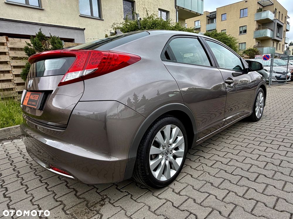 Honda Civic 1.4 i-VTEC Comfort - 11