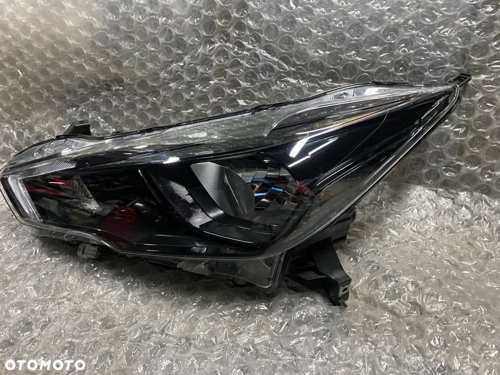 LAMPA LEWA ZWYKŁA CZARNA NISSAN MICRA K14 26060 5FA08 KOITO 100-18728 - 3