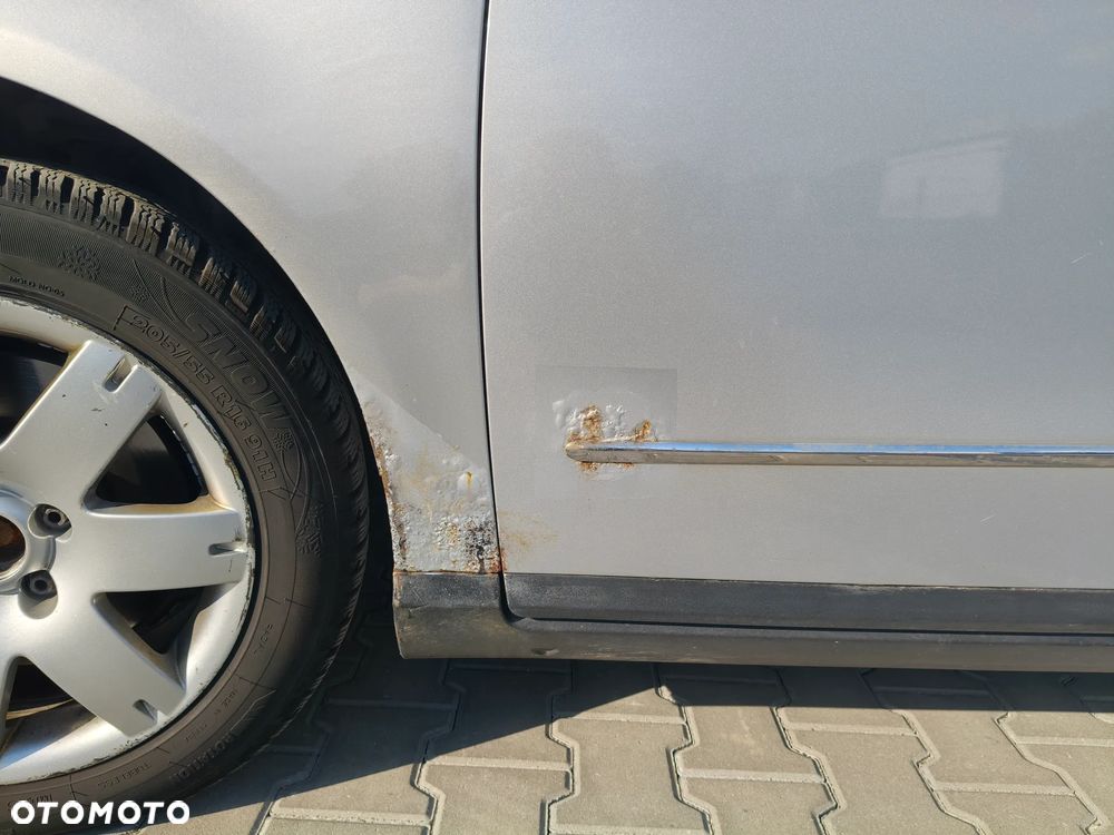 Volkswagen Passat 1.9 TDI Highline - 6