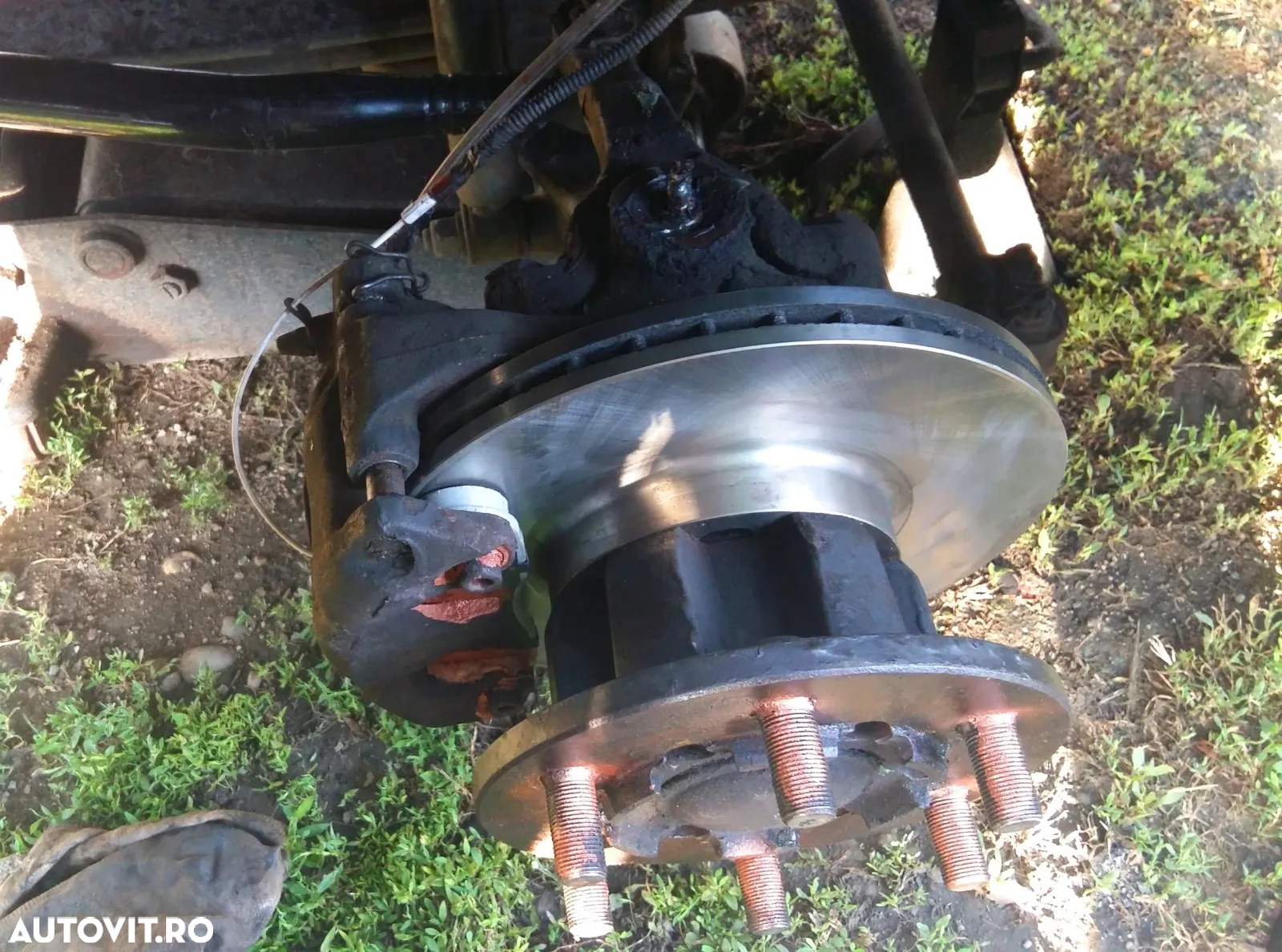 Butuc roata fata NISSAN ATLEON L35 ECO-T100 L35-09 EBRO L35-08 SEMERING ROATA RULMENTI DISC PLACUTE SURUBURI KIT PIVOTARE - 31