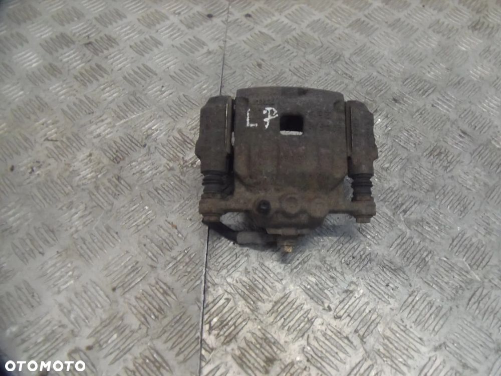FORD FIESTA MK7 1.6TDCI 013R ZACISK HAMULCOWY LEWY PRZÓD PRZEDNI - 1