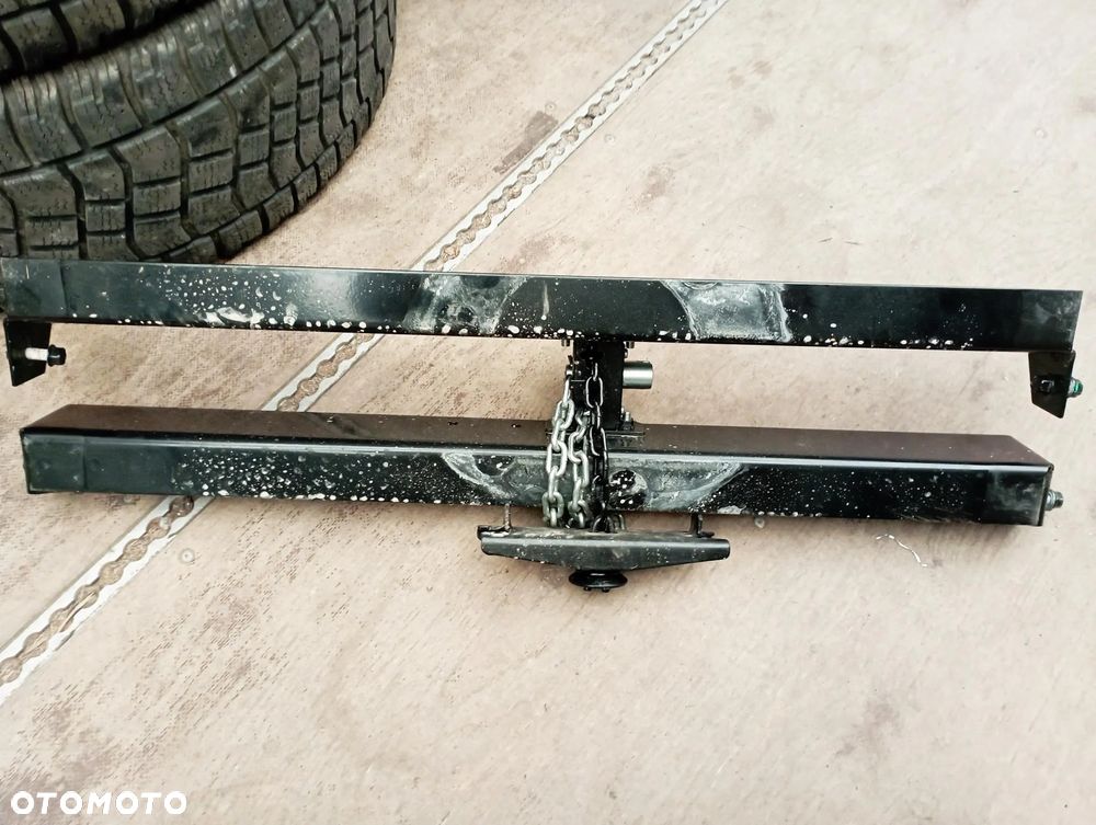 WINDA UCHWYT koła zapasowego NOWY oryginalny ISUZU N35, L35,M21, NPR, P, NNR, NLR - 1