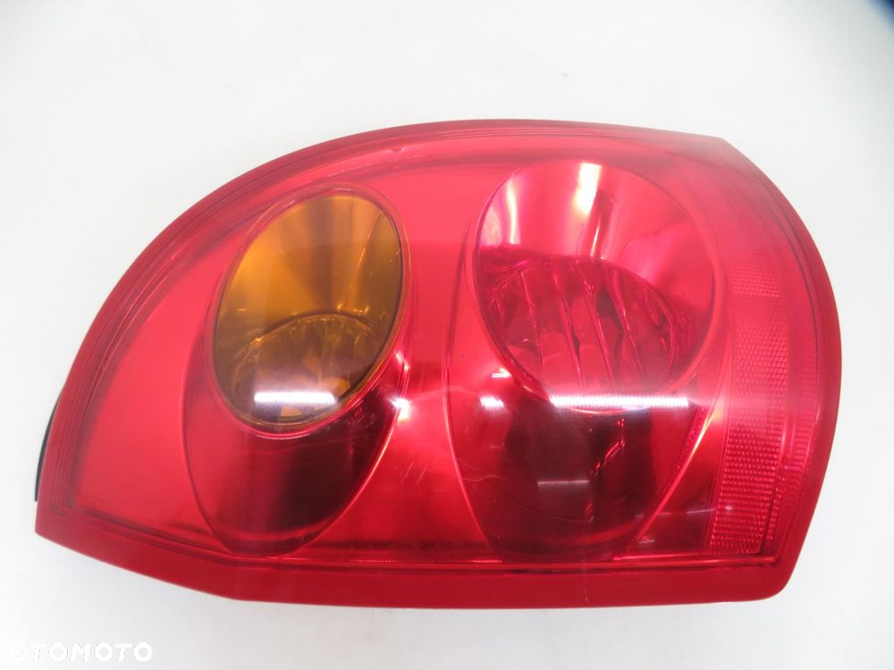 LAMPA LEWA TYLNA NISSAN PRIMERA P12 KOMBI  89077086 - 8