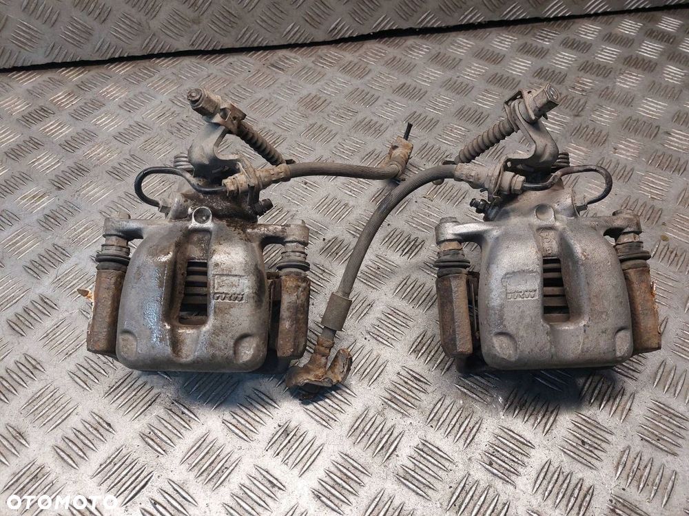 TARCZE HAMULCOWE TYŁ + KLOCKI + ZACISKI  VOLKSWAGEN TOURAN I 254MM - 12