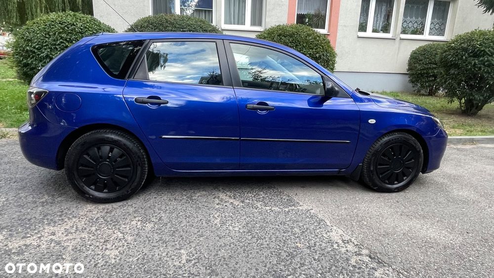 Mazda 3 1.4 Comfort - 1
