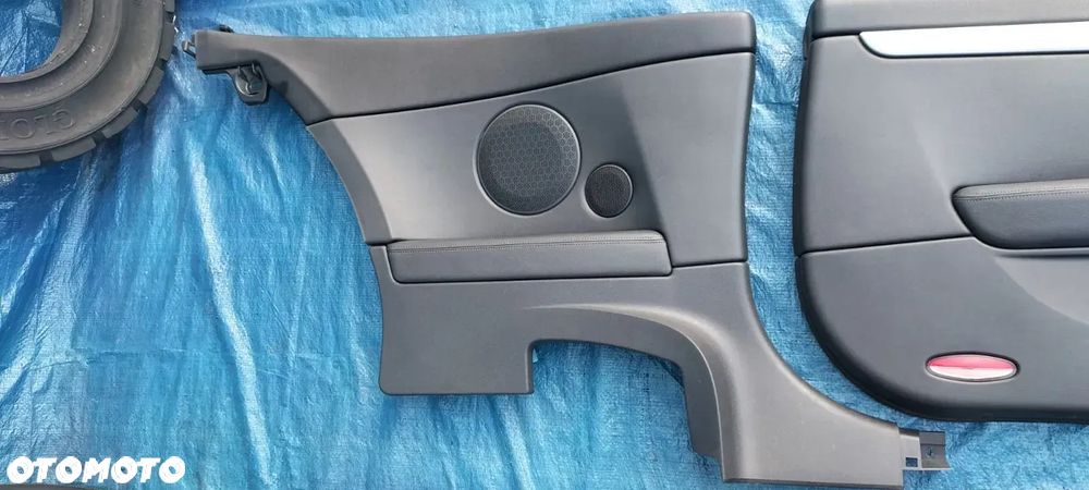 BOCZEK TAPICERKA SKÓRA LEWY TYŁ RENAULT LAGUNA III 3 GT COUPE