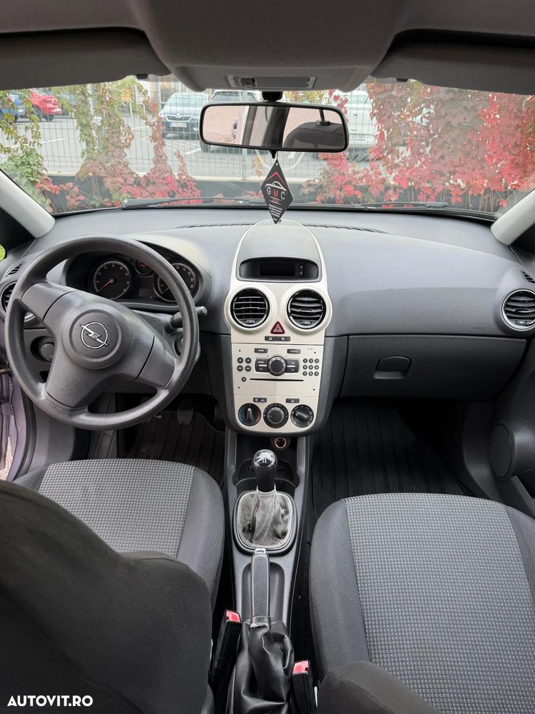 Opel Corsa 1.2i Cosmo - 8