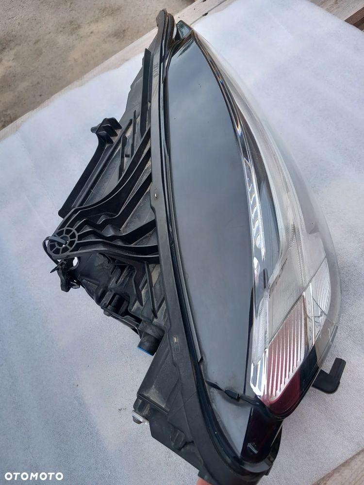 Lampa VOLVO V60 S60 przód/przednia prawa OE AECY6 - 16