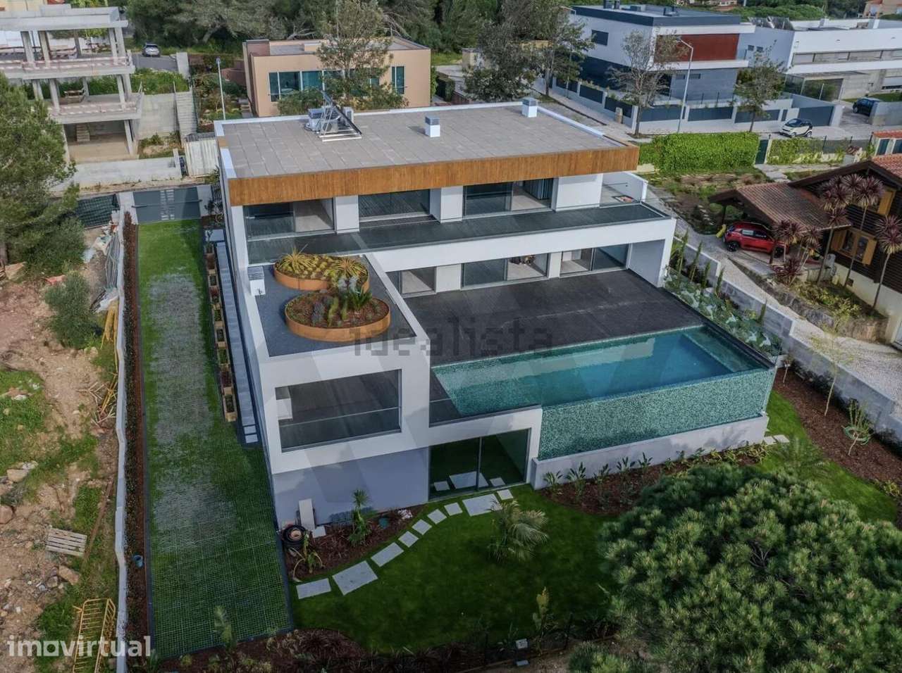 Moradia de luxo em Cascais com 5 suites piscina de bordo infinito, gar - Grande imagem: 4/55
