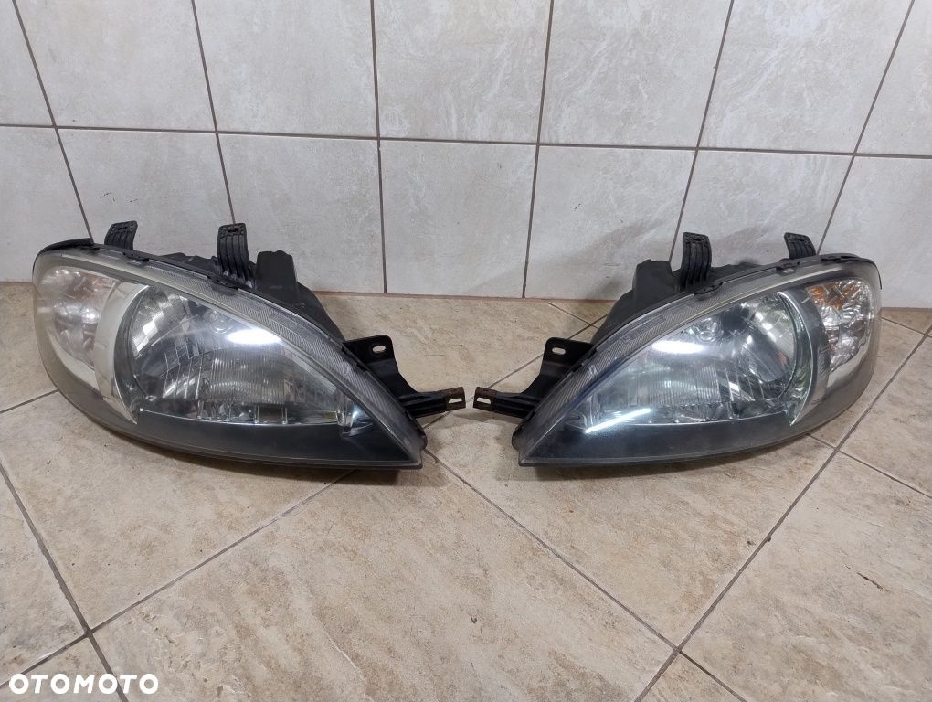 Chevrolet Lacetti lampa prawa lewa komplet Europa oryginał wysyłka - 1