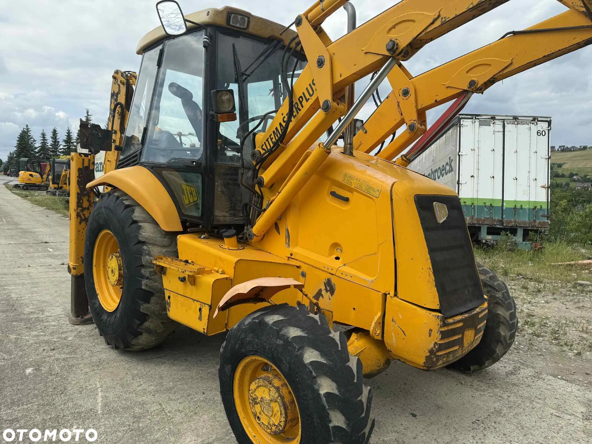 JCB koparko-ładowarka KOMATSU WB97 jcb 3cx - 2