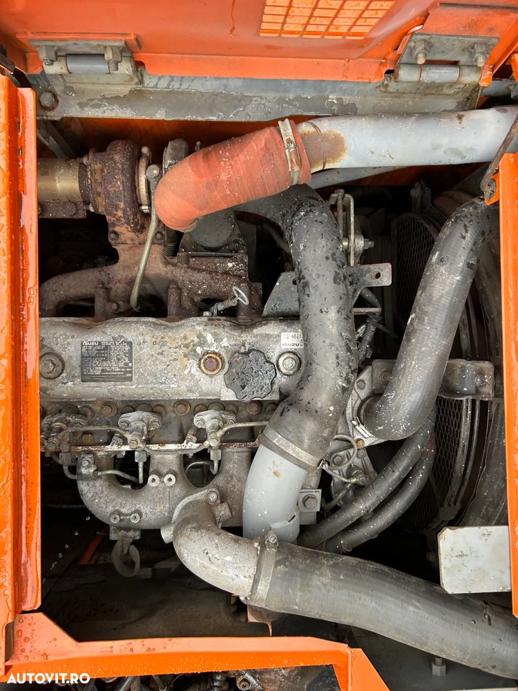 Hitachi ZX135US - 12