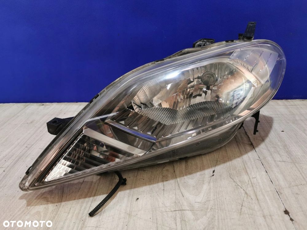 Honda FRV FR-V lampa reflektor lewa Anglik - 1