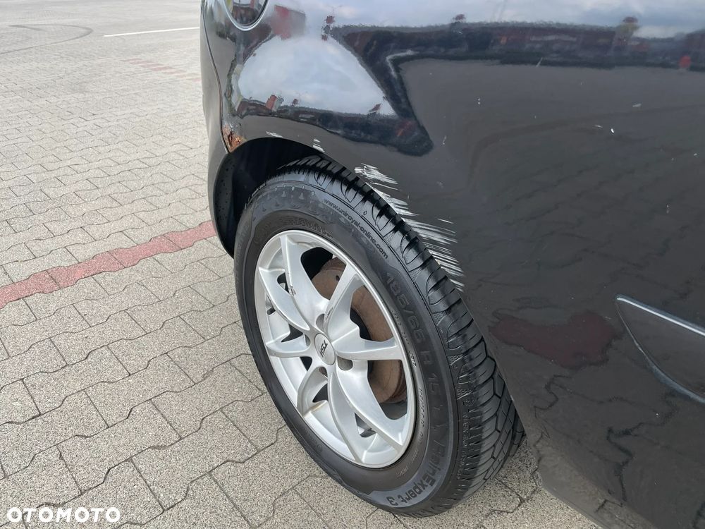 Opel Corsa 1.4 16V Cosmo - 10