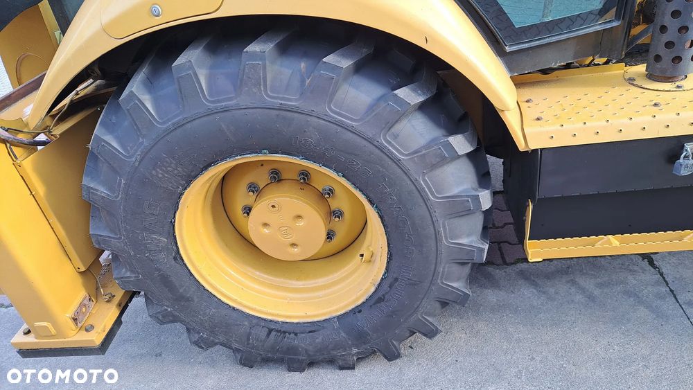 Caterpillar 428F - 12